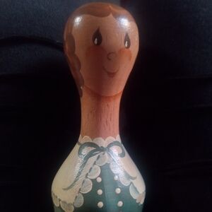 Handcrafted Wooden Doll with Painted Details